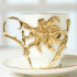 Чашка чайная из фарфора ИФЗ в подстаканнике из латуни "Лилия"